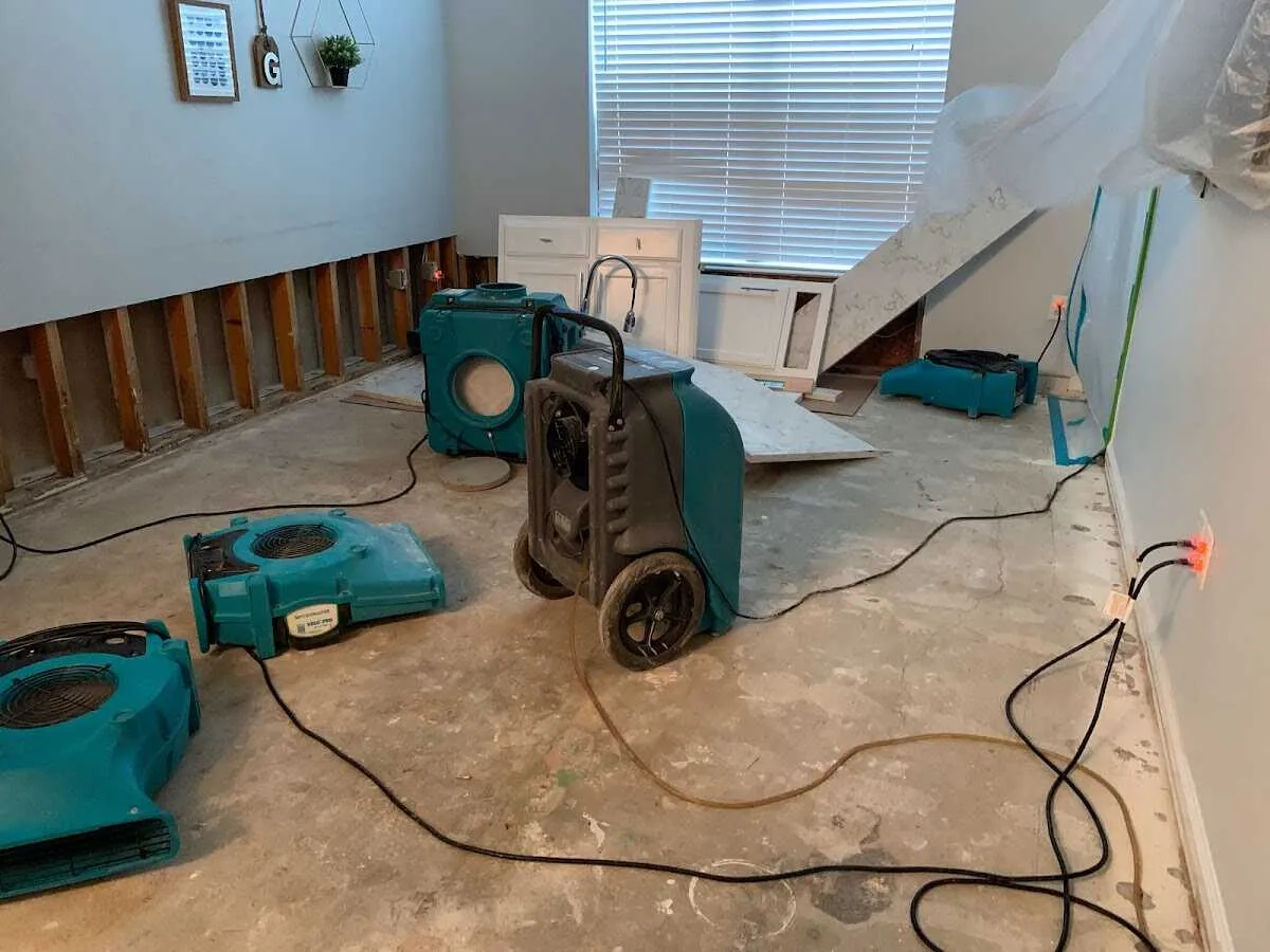 Dehumidifier in flood-cut room for Water Damage Restoration in Fletcher